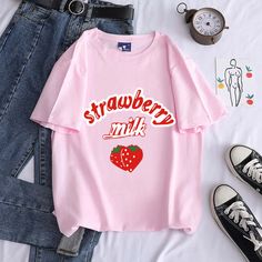 "Yummy Strawberry" TeeCotton MaterialIf you prefer a looser style. please choose a up size.Pro Tip: Asian sizes usually run small compared to American or European sizes. Please make sure to measure yourself. Soft Pink Aesthetic Clothes, Casual White Top With Strawberry Print, Casual Short Sleeve Tops With Strawberry Print, Cute Oversized Slogan Tops, Casual White T-shirt With Strawberry Print, Casual Tops With Strawberry Print In Relaxed Fit, Trendy Strawberry Print Crew Neck Shirt, Trendy Strawberry Print Crew Neck T-shirt, Casual Strawberry Print Crew Neck Shirt