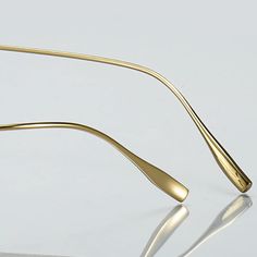 The Muzz Men's Rimless Square Titanium Eyeglasses 10151 offer a stylish and sophisticated eyewear option for men. These eyeglasses feature a rimless design, giving them a sleek and modern look. The frame is made from high-quality titanium material, ensuring durability and long-lasting use. Titanium is known for its strength and lightweight properties, making these eyeglasses comfortable to wear all day. Designed in China (Mainland), the Muzz Men's Rimless Square Titanium Eyeglasses 10151 are met Minimalist Formal Sunglasses With Tinted Lenses, Modern Metal Frame Sunglasses For Formal Occasions, Modern Rimless Sunglasses With Metal Frame, Formal Rimless Sunglasses With Metal Frame, Modern Rimless Metal Frame Sunglasses, Modern Rimless Glass Sunglasses, The Frame, Timeless Accessories, Solid Pattern