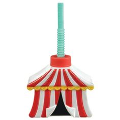 a red and white circus tent with a green pole