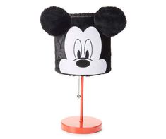 a mickey mouse head on top of a stand