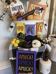 a table topped with lots of halloween decorations