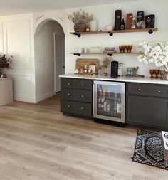 the kitchen is clean and ready to be used as an entertaining area for wine tasting