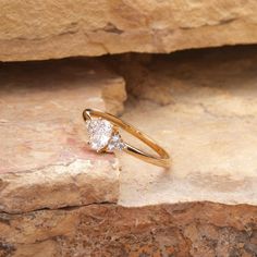 a close up of a ring on a rock