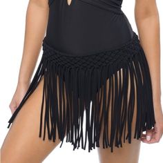 Product Description: Add Flair To Your Pre- And Post-Swim Ensemble With This Breezy Fringed Skirt Cover-Up. 86% Nylon / 14% Spandex Machine Wash; Hang Dry Imported Black Tie-side Bottom For Vacation, Black Tie-side Bottoms For Vacation, Black Tie-side Vacation Bottoms, Bohemian Swim Bottoms For Beach Season, High Waist Black Swim Skirt For The Beach, Black Tie-side Beach Bottoms, Black Tie-side Bottoms For Beach, Black High Waist Swim Skirt For Beachwear, High Waist Black Swim Skirt