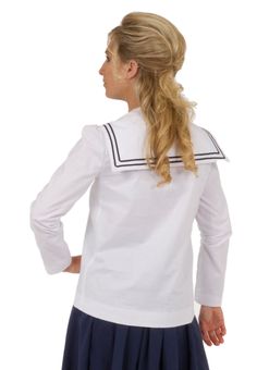 You will find such pleasure in this sailor blouse styled from the Edwardian Era. Traditional overblouse has sailor collar trimmed in middy braid. Classic blouse has long narrow sleeves. Both sleeves and blouse have wide hem. 100% cotton. Rayon trim. Machine or hand wash on gentle cycle in cold water; Tumble dry on low setting or hang to dry.The model is wearing a twill skirt and carrying a parasol - both priced separately. Designed and made proudly by Recollections in America! The following are White Sailor Collar Top For Work, White Sailor Collar Tops For Workwear, Cotton Sailor Collar Top For Work, Classic White Tops With Sailor Collar, Sailor Tops For Women, White Sailor Style Long Sleeve Tops, Classic White Top With Sailor Collar, Fitted Cotton Tops With Sailor Collar, Cotton Sailor Style Top