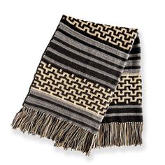 a black and white striped scarf with fringes