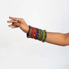 Bohemian Beaded Bracelets For Puja, Bohemian Bracelets For Puja And Diwali, Handmade Bohemian Bangle For Navratri, Bohemian Handmade Bangle For Navratri, Bohemian Bangle For Navratri Gift, Bohemian Bracelets For Diwali Puja, Bohemian Bracelets For Puja During Diwali, Bohemian Bracelets With Motifs For Diwali, Traditional Multicolor Beaded Bangle Bracelets