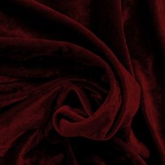 a red velvet fabric with very thin folds