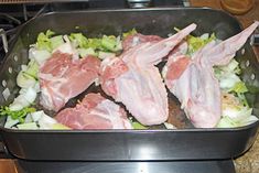 raw chicken and lettuce in a pan ready to be cooked on the stove