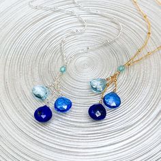 Easy style to wear everyday, this symbolic necklace is featuring 3 of our favorite blues: Topaz, Blue Qz and Lapis Lazuli. Limited edition. 16-18”. Silver or 14k gold filled.