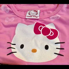 I Know! First You Have A Top With This Adorable Kitty On The Front And Then You Add Two Bows At The Top And Bows Screened On The Front! Could It Get Any Better? 92% Cotton And 8% Spandex For Movement! Made By Evy Of California Inc! New! Casual Hello Kitty Print Tops For Sleepover, Cute Hello Kitty Print Tops For Sleepover, Cute Hello Kitty Tops For Sleepover, Kitty Clothes, Hello Kitty Clothes, Kitty Party, Hello Kitty Party, Cat Party, Kids Shirts