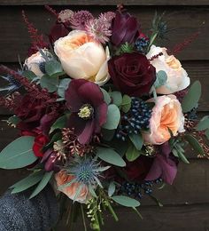 an arrangement of flowers is shown on a wooden background with words describing the different types of flowers