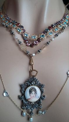 Stunning, Exeptional, Unique, One Of A Kind Necklace with a Watch...Victorian/ Georgian, in very good Antique Condition..Watch frame is Silver and silver dots on the chain is Silver as well..Weight is about 49 Grams 18k Yellow gold / Silver...Chain is 30 inches.Gorgeous Lady Enamel Portrait.Layaway plan is available.. Luxury Vintage Charm Pendant Jewelry, Victorian Necklace With Detachable Pendant For Gift, Heirloom Pendant Necklaces With Lobster Clasp, Heirloom Pendant Necklace With Lobster Clasp, Luxury Blue Locket Necklace, Luxury Blue Locket Jewelry, Gold Necklaces With Detachable Pendant For Collectors, Victorian Jewelry Locket For Evening, Collectible Gold Jewelry With Detachable Pendant