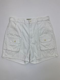 Vintage St John's Bay White Cargo Shorts Waist: 34" Length: 5" Flaws: Small marks throughout Instagram: @markham.vtg Please remember most, if not all of our items are vintage and used. Therefore it will naturally have some wear and tear. Refer to photos for any flaws and measurements for sizing. White Cotton Cargo Shorts For Summer, White Relaxed Fit Cargo Shorts, Mid-rise Cotton Cargo Shorts With Pockets, White Cotton Cargo Shorts With Built-in Shorts, Military Style Cotton Cargo Shorts, Shorts Cargo, Short Waist, Skorts, St John