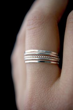 "This item is made to order and will ship after 7-10 business days. That time does not include holidays, weekends or shipping time! These rings are handmade by the designer herself in her Portland, OR studio. * MEDIUM THICK RINGS * These \"medium thick\" rings mix together beautifully! The contrast between smooth, hammered and twist textures is incredibly eye-catching. These stacking rings are perfect for mixing and matching! Either wear them all at once or mix them in with your favorite rings f Minimalist Stackable Rings, Thick Stacking Ring, Thick Rings, Delicate Silver Rings, Jewelry Design Studio, Rope Ring, Rope Rings, Thick Ring, Stacking Ring Set