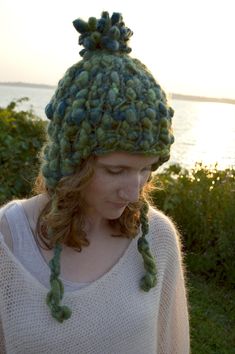 This hat is just the ticket to keep you warm and cozy on a chilly winter day. The pattern uses 1 skein of our handspun Pixie Dust yarn, which is super bulky, lusciously soft and comes in 24 different sparkly colors. *This pattern is a PDF download that you will receive once payment is complete Skill Level: Intermediate Knitter Materials: 1 Skein Pixie Dust Yarn Needle Size: Size US 17 circular needles, 16” in length Size US 17 double pointed needles Size: One size fits average female head (22" i Earflap Hat Pattern, Hat Pattern Knit, Knit Collage, Earflap Hat, Female Head, Double Pointed Needles, Super Bulky, Hat Knitting Patterns, Pixie Dust