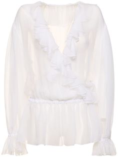 Deep ruffled V-neckline. Elastic cuffs and waist. Model is wearing a size38 Elegant Ruffled V-neck Blouse, Elegant V-neck Ruffle Blouse, V-neck Ruffle Blouse For Daywear, White V-neck Blouse With Ruffle Hem, Silk Shirt, Dolce And Gabbana, Great Deals, Womens Tops, Models