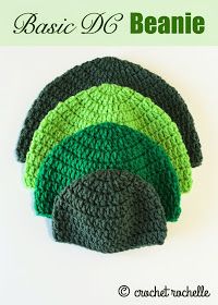 four knitted hats sitting on top of each other in different shades of green and black