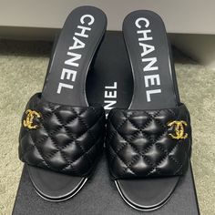 Brands New Chanel Black Lambskin Stacked Thick Cone Quilted Back Heel Slip On Slide Mules Comes With Box And Dust Bag Chanel Espadrilles Mules, Luxury Slip-on Heels With Heel Strap, Designer Flats With Removable Insole, Designer Slip-on Heels With Heel Strap, Luxury Black Sandals With Leather Sole, Designer Calf Leather Slip-on Heels, Luxury Black Flat Heel Sandals, Luxury Black Sandals With Reinforced Heel, Black Calf Leather Slip-on Heels