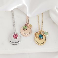 "Round necklace with your kids birthstones, the dainty coin can be engraved with names and symbols,  a great gift for mom, new moms, sister and grandma, you can purchase the necklace with up to 10 birthstones of your choice. The necklace is engraved on the front only, if you want a message engraved on the back you can purchase the extra side engraving following this link, please select the option TEXT: https://www.etsy.com/ca/listing/1516288937/add-on-personalization-engraving?click_key=ddc4ed739d39c0ce77e302cba362f062a9e68b2e%3A1516288937&click_sum=6c692b9f&ga_search_query=add%2Bon&ref=shop_items_search_3&frs=1&crt=1 We engrave each item in our studio, using a laser engraving process that creates a very precise and detailed image, the machine creates a darker tone image with no ink, this Grandma Necklace Birthstone, Birthstone Jewelry Mothers, Grandma Jewelry, Mom Necklace Personalized, Grandmas Jewelry, Grandma Necklace, Personalized Grandma Gifts, Mama Necklace, Zodiac Sign Necklace