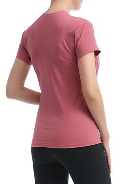 Gathered at the sides, this stretchy jersey top is bump-friendly and features a surplice V-neck that makes nursing easy once baby arrives. 25" length Surplice V-neck Short sleeves 88% nylon, 12% spandex Machine wash, tumble dry Imported Pink V-neck Athleisure Top, Pink V-neck Workout Tops, Nursing Top, Nursing Tops, Maternity Nursing, Jersey Top, Fashion Advice, Bump, Nursing