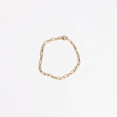 Trendy, light, and simple. Our paper clip bracelet is the perfect addition to everyday wear. Handmade right here in our store in Steamboat Springs, CO. All our jewelry is gold-filled offering long-lasting wears affordable to everyone. 18K gold filled Available in Sizes; 6.5" and 7" Nickel Free Hypoallergenic Care: polish occasionally. avoid exfoliating scrubs and chlorine. Care: Avoid salt water, chlorine and harsh chemicals. Polish regularly with a jewelry cloth to improve shine. Be mindful tha Modern Gold Plated Paperclip Bracelet For Everyday Wear, Modern Gold Plated Paperclip Bracelet For Everyday, Simple Everyday Paperclip Chain Jewelry, Minimalist Yellow Gold Bracelet With Rectangular Links, Minimalist 14k Gold Oval Link Bracelet, Gold Plated Link Paperclip Bracelet, Dainty 14k Gold-filled Paperclip Bracelet For Everyday, Dainty 14k Gold Filled Paperclip Bracelet For Everyday, Everyday Gold Bracelet With Box Chain