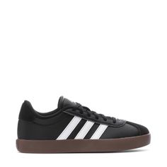 a black and white adidas sneakers on a white background