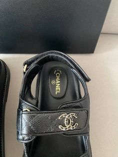 Gender: Women Brand: CHANEL Product Name: CC logo velcro sandal caviar black G35927 Balaan Code: 84264139 Color: black Origin: France Luxury Sport Sandals With Round Toe For Summer, Black Open Toe Sport Sandals With Logo Strap, Designer Black Sandals With Logo Strap, Black Designer Sandals With Logo, Black Sport Sandals With Logo Strap For Summer, Black Logo Sandals For Summer, Black Sport Sandals With Buckle Closure And Round Toe, Black Sandals With Logo Strap For Summer, Designer Round Toe Sandals With Logo