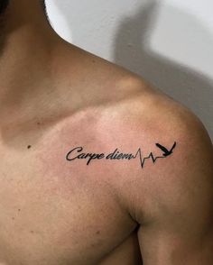 a man with a tattoo on his chest that says carpel d'emo