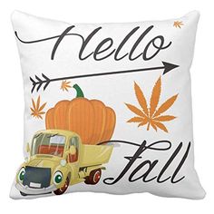 a pillow with a truck and pumpkin on it