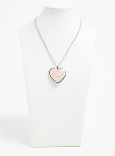 A pink heart pendant necklace features a long silver-toned chain with delicate beaded accents that’s an elegant option to accessorize your next romantic outfit. Lobster clasp. 32” length with 3” extender. Base metal. Imported. The best plus size women's silver-tone pink caged heart pendant necklace pendants in pink. Torrid is your destination for the freshest spring and summer styles. Caged Heart, Cage Pendant Necklace, Pink Heart Pendant, Celtic Knot Necklace, Floral Statement Necklace, Resin Pendant Necklace, Wedding Ring Necklaces, Romantic Outfit, Necklace Pendants