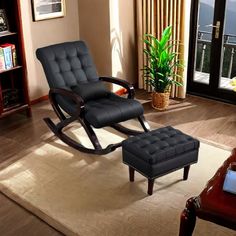 a living room with a rocking chair and ottoman