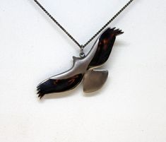 A hawk is a large bird with a short, hooked beak, sharp claws, and very good eyesight. The hawk symbolizes the ability to use intuition and higher vision in order to complete tasks or make important decisions. ----Details---- A flying Hawk necklace from solid sterling silver hand carved using the lost wax method. The finish is a combination of matte and glossy handcrafting. Size: 52mm/ 2.04 inch wing width comes on a 18 inch/ 45 cm long sterling silver chain.If you would like a 20 inch / 50 cm l Flying Hawk, Good Eyesight, Airplane Necklace, Sharp Claws, Dove Necklace, Tiny Pendant, Travel Jewelry Box, Mixed Metal Jewelry, Bird Necklace