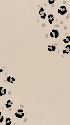 black and white animal prints on a beige background with space in the center for text