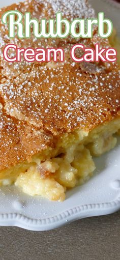 a close up of a cake on a plate with the words rhubarb cream cake