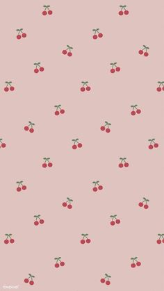 a pink background with cherries on it