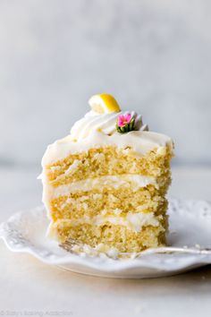 a slice of lemon layer cake on a plate with the words, real ingredients and real flavor