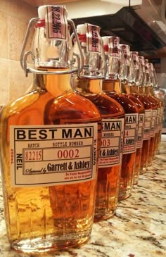 bottles of whiskey are lined up on the counter