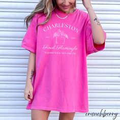 a woman wearing a pink charleston t - shirt