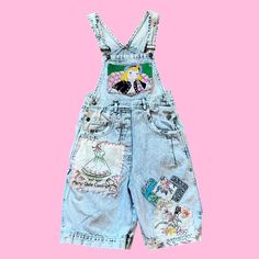 Let's Kitch-ify some overalls ! 100% Upcycled and eco friendly vintage overalls  given new life with the addition of vintage embroidery, hankies, and textiles ✨ To give it that crazy quilt feel, I've hand embroidered stitches to the pieces, a absolute labor of love ❤️ Measurements: Bust: free. Waist: 28 in. Hip: 36 in. Inseam: 9 in. Length: 22 in. Total rise: 28 in. All items are made of true vintage materials and maay show signs of the age. Please look at pictures closely. Vintage Spring Overalls, Vintage Denim Overalls With Patchwork, Vintage Cotton Shortalls For Spring, Vintage Bib Front Shortalls For Spring, Vintage Cotton Overalls, Upcycled, Vintage Cotton Patchwork Overalls, Vintage Spring Overalls With Bib Front, Vintage Spring Shortalls Overalls, Vintage Spring Shortalls Overall