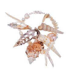 The Citren bracelet is handcrafted with a stunning blend of cerithium vulgatum, tutufa rubeta, luahnus, Terra areolata, and mini Turitella sea shells. Wipe with a damp cloth Seashell Jewelry, June Birthstone Jewelry, Artisan Gift, Zodiac Jewelry, Jewelry Ring Box, Pearl Jewellery Earrings, Evil Eye Jewelry, Earring Sale, Eye Jewelry