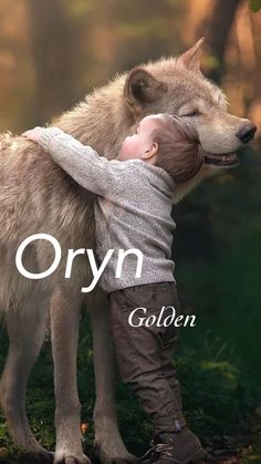 a young boy hugging an adult wolf with the words oryn written on it's back