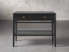 a small black table with two drawers on one side and an open drawer on the other