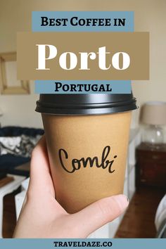 a person holding up a coffee cup with the words best coffee in portugal on it