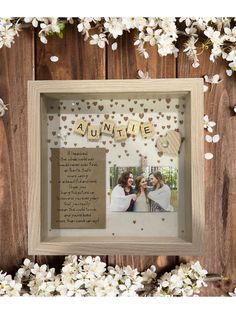 a wooden frame with the words,'i love you to the moon and back '