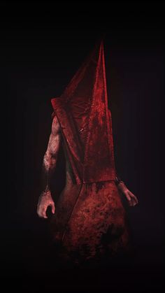 a creepy looking man with blood on his face and arms, wearing a red cloak