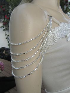 Handmade item Shoulder Necklace Bridal shoulder necklace 2 pieces per order. handcrafted Crystal Detachable Strap made to order Please get in touch for more information. Thank you so much for choosing my store. It is very importent to let my customers happy, so dont hesitate to contact me for your questions. Standart shipping I ship from Turkey , General delivery durations are USA : 12 /20 days Canada : 10/20days Australia: 15/25 days Shoulder Necklace Wedding, Pearl Shoulder Jewelry, Beaded Clothes, Shoulder Beads, Wedding Dress Straps, Shoulder Accessories, Straps Wedding Dress, Beaded Sleeves, Shoulder Jewelry