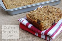 two pieces of granola sitting on top of red and white towels