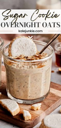 a bowl filled with overnight oats on top of a wooden cutting board next to two glasses