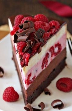 a piece of chocolate raspberry cheesecake on a plate